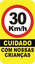 Placa: 30 km/h. Cuidado com nossas crianças.